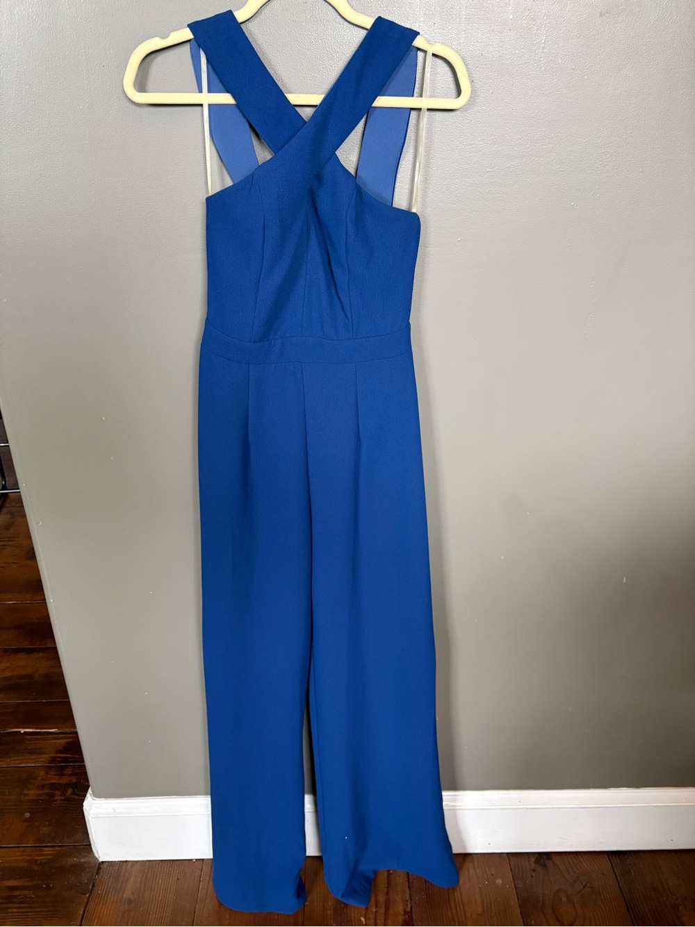 Karlie jumpsuit blue new with tags criss cross straps